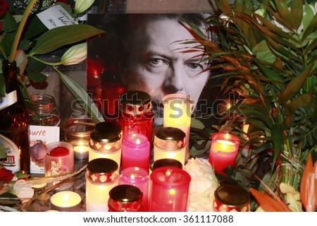JANUARY 11, 2016 - BERLIN: candles, flowers, images - mourning for the deceased pop star David Bowie in front of the house in the Hauptstrasse in Berlin-Schoeneberg in which he lived in the 1970s.