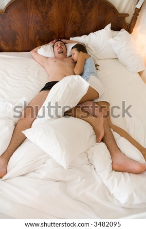 Young couple in their bad-room  (honeymoon morning)
