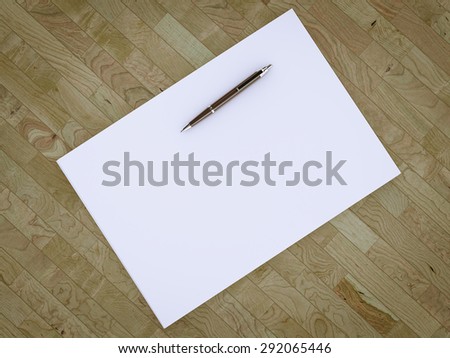Blank stationery set on wood background / a4 paper and pen. Business mockup