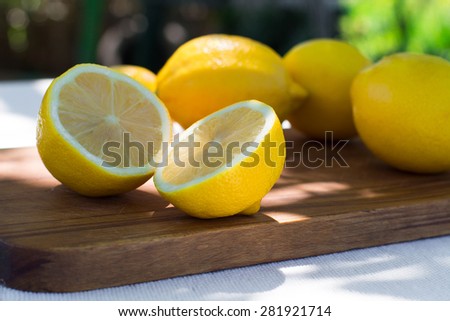 fresh lemons on the table in the open air