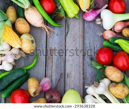 frame of vegetables. Healthy eating background of different fruit and vegetables on an old wooden table
