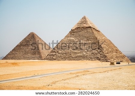 The Great Pyramid of Giza, the Cheops Pyramid, and its adjacent Khafre pyramid, found outside Cairo, Egypt.