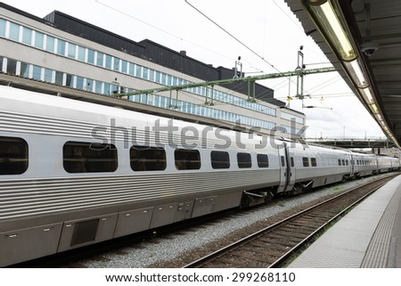 STOCKHOLM, SWEDEN - JULY 22, 2015: Train running late, waiting to depart from Stockholm Central Station.