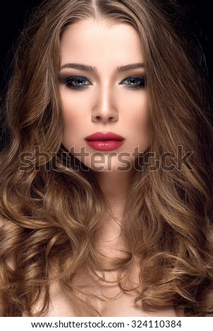 Beautiful woman with nice make up and red lips