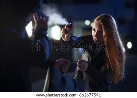 pepper spray or tear gas for self-defense by woman