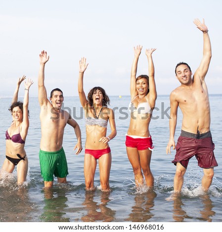 People jumping in the sea