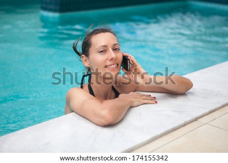 Woman calling from pool