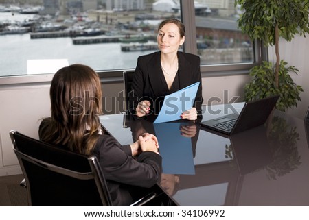 Young woman having a job interview in a beautiful office