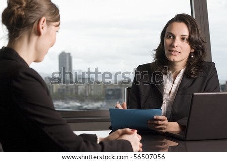 Young woman coming to a job interview