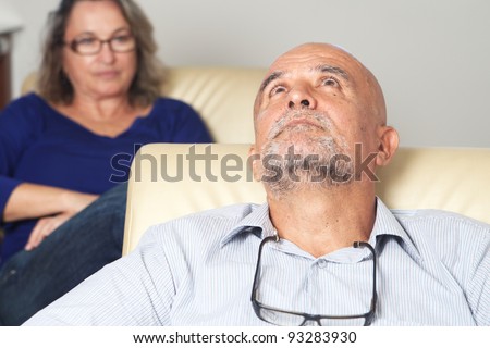 Middle aged man talking to psychologist