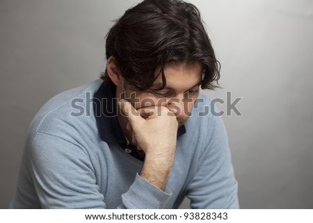Dark-haired man lonely