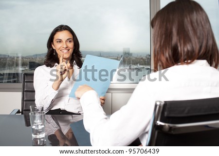 Consultation with female financial adviser in a nice office
