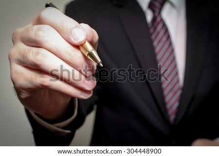 businessman hand hold pen prepare to writing