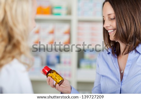 Customer in a pharmacy or drugstore is looking for products