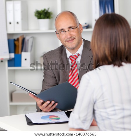 businessman and female candidate in personal interview