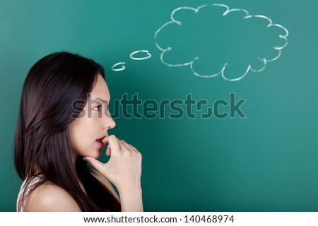 young woman with cloud drawn on blackboard