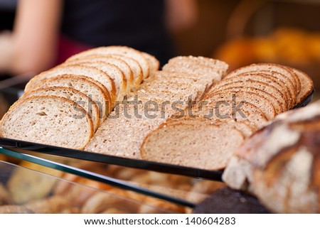 slices of bread arranged on counter of a bakery
