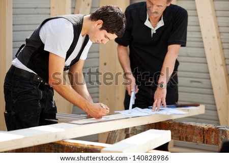 A team of two carpenters at work