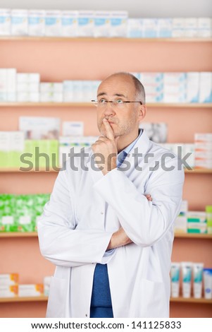 Looking up pharmacist thinking over the medicine backgrounds