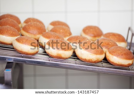 Sweet Pastry drying on rack in Bakery Shop