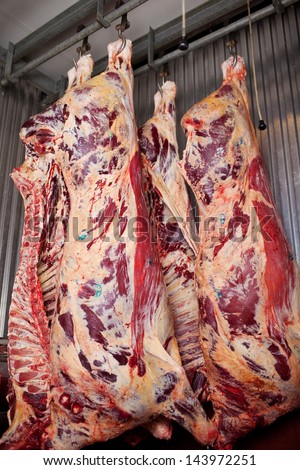 Beef meat hanging on trail at butcher\'s shop