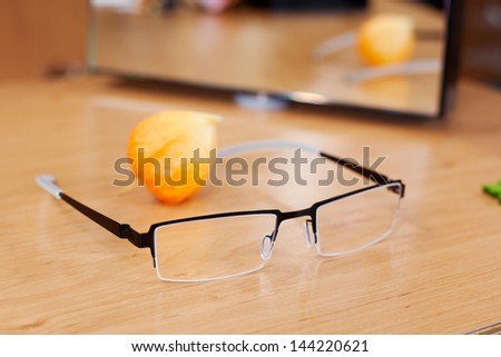 Closeup of glasses on wooden table