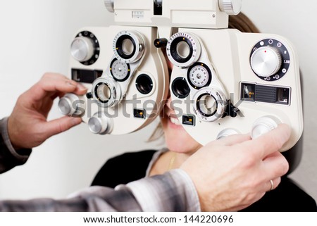 doctor examining patient at the eye clinic