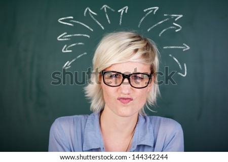 Closeup portrait of an expressive blond woman with thoughtless chaos