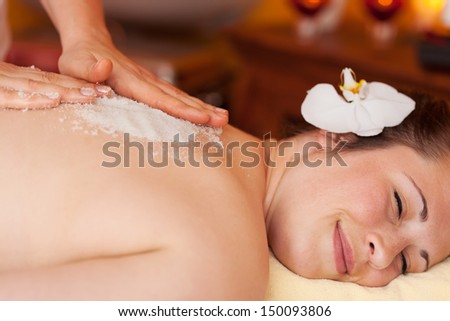 Body Peel Using Coarse Marine Salt In A Health Centre Or Spa With The Salt Crystals Used As An Exfoliator And To Replace Essential Minerals