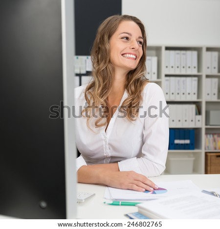 Sitting Happy Office Girl in White Long Sleeve Shirt, Leaning on the Table While Looking at Right Frame