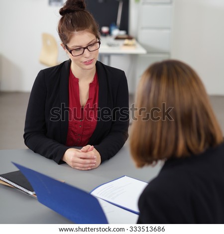 young woman in a job interview talking to a female manager