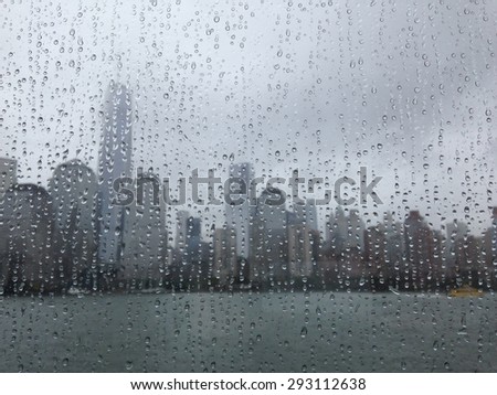 New York city in rain through the window
