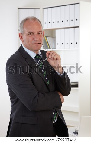 Old Business man in office with glasses