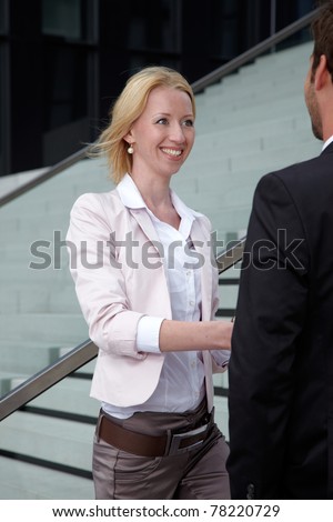 woman shake hand to businessman