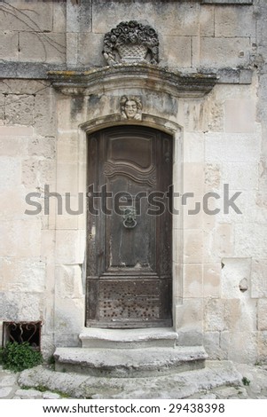 Old historic door in french palace in provence, france,