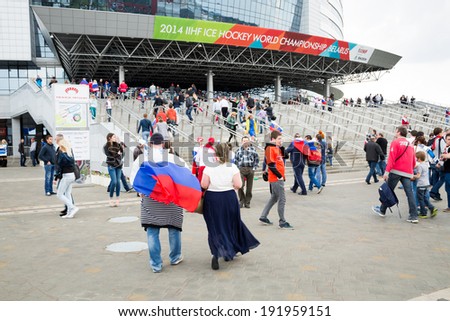 MINSK, BELARUS - MAY 9 - Russian Fans with Flags in Front of Minsk Arena on May 9, 2014 in Belarus. Ice Hockey World Championship (IIHF) Opening.