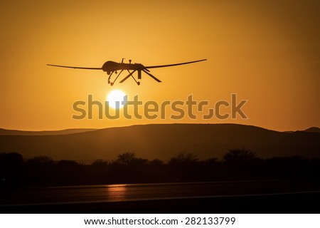 A drone performing a low pass in sunset