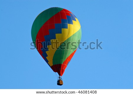 Hot air balloon on sky before landing