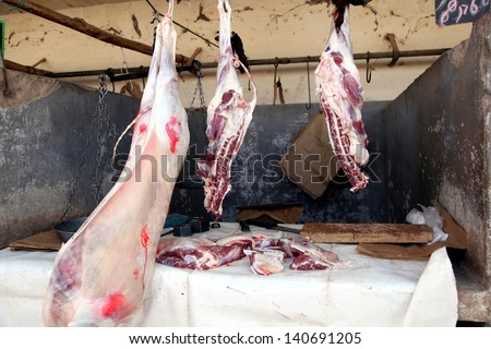 At the butcher
