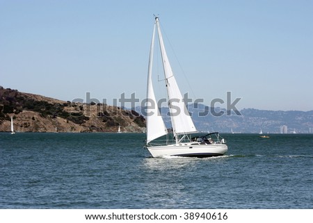 sailboat on the ocean on a sunny summer day