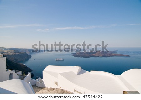 Beautiful view on Santorini volcano, blue see and sky