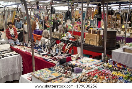 LONDON, UK - MAY 15, 2014: Antique display Greenwich market. Famous place to buy an art, crafts, antiques etc.