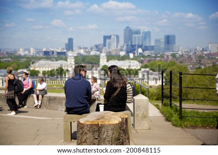 LONDON UK - MAY 15, 2014: View on business district Canary Wharf from old English park, south of London