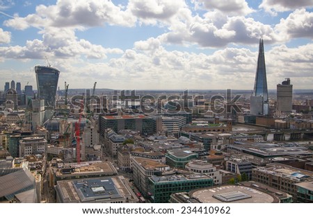 LONDON, UK - AUGUST 9, 2014 Shard of glass and London view. City of London one of the leading centres of global finance