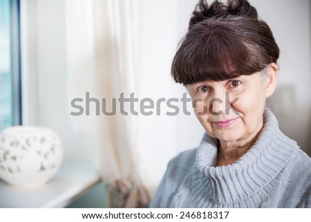 Pension age good looking woman portrait