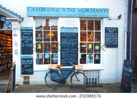 CAMBRIDGE, UK - JANUARY 18, 2015: Wine shop with bike parked by the wall