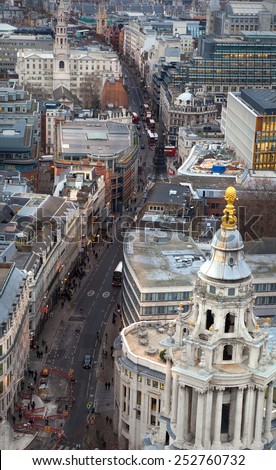 LONDON, UK - JANUARY 27, 2015: Busy streets City of London, business and banking aria. London\'s panorama in sun set. View from the St. Paul cathedral