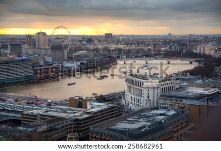LONDON, UK - JANUARY 27, 2015: City of London, river Thames and beautiful sunset. London\'s panorama. View from the St. Paul cathedral