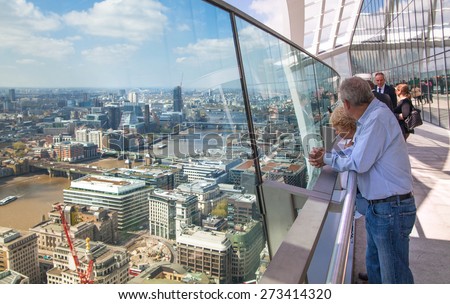 LONDON, UK - APRIL 22, 2015: People in Sky Garden Walkie-Talkie building. Viewing platform is highest UK garden, locates at the 32 floor and offers amazing skyline of London city.
