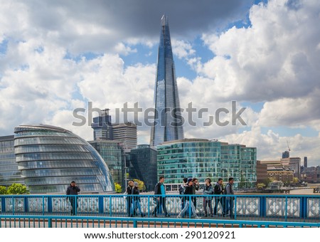 LONDON, UK - APRIL 30, 2015: City of London business aria view from the Tower Bridge. Shard and London hall buildings